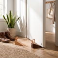 Scandinavian Wooden Door Stop in use